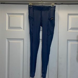 Kerrits size S grip in legs & butt pockets. Riding